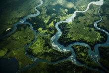 Aerial View Of Winding Rivers And Lush Valleys, Showcasing The Earth's Intricate Beauty.
