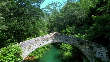 Canvas Print - Drone footage over the stone bridge of Pont Des Tuves, Hiking area in Montauroux, France