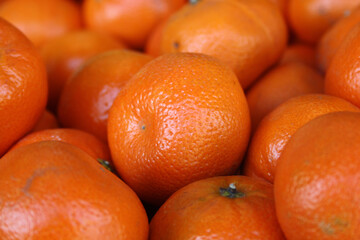 Canvas Print - Pile of shiny ripe orange