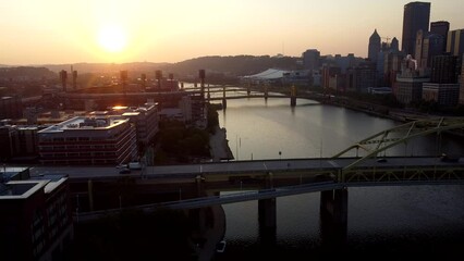 Wall Mural - Drone shot of West End Overlook Park with West End Bridge at sunset golden hour