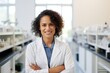 Black female Biotechnologist smiling at the camera, Women in STEM, Minority representation in STEM feminism