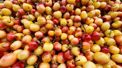 Wall Mural - Abundance of ripe cherries in the market.