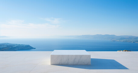 Marble podium with defocused views of the sea in the background. Copy space