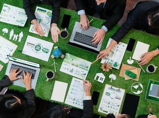 Panorama top view of business people planning business marketing with environmental responsibility for greener ecology. Productive teamwork contribute nature preservation and sustainable future.Quaint