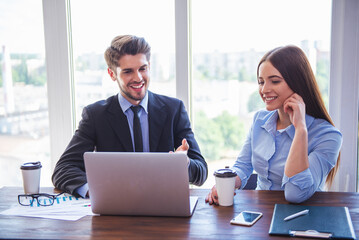 Wall Mural - Beautiful business couple working