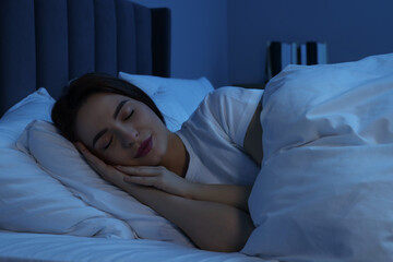 Sticker - Beautiful young woman sleeping in bed at night