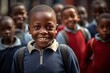 © RPL-Studio - Happy cute black schoolkid with his friends.