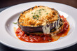 Eggplant Parmesan: A Delicious Homemade Vegetarian Dish with Melted Cheese, Golden Bread Crumbs, and Tomato Sauce