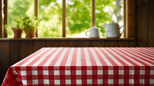 Tablecloth In Red And White Checkered Pattern Adorns A Table By The Window