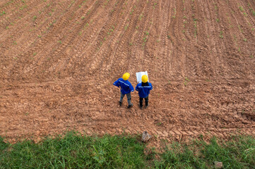 Top view of Engineering people meeting in agricultural field, Engineering people, corporate working, teamwork concept