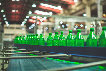 Wall Mural - Beverage factory interior. Conveyor flowing with bottles for water