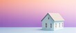© HN Works - a dream home with a minimalist design is portrayed through miniature white toy house placed on a colorful background of blue and purple pastel colors. is presented in a flat lay top view style, with