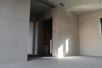 interior of new apartment in shell and core state or developer standard. inside empty rooms before r