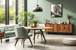 canvas print picture - Mint color chairs at round wooden dining table in room with sofa and cabinet near green wall. Scandinavian, mid-century home interior design of modern living room.