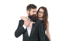 Sexual Harassment. Sexy Lady Embrace Her Bearded Man. Couple In Love. Business Meeting And Partnership. Love And Romance. Formal Couple Grooming For Engagement. Elegant Woman. Male Tuxedo Fashion