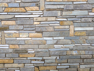 Wall Mural - stone wall made out of irregular pieces