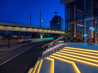 Gothenburg, Sweden, May 30, 2023: Illuminated staircase of the hotel, in the background the congress center in Gothenburg in the blue hour