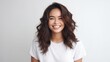 © Pixel Mind - Young smilling woman posing on soft blur background.