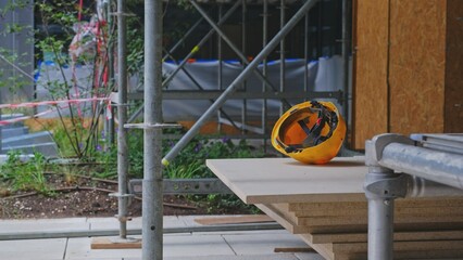 Safety Helmet Left under Scaffolding at Construction Site