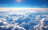 Fototapeta  - the aerial view of clouds and sky as seen from inside an airplane.