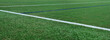 Soccer field texture panoramic background. synthetic grass football pitch empty wide banner with copy space for design