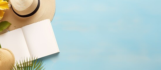 Poster - A writing book with summer beach accessories on the background, providing copy space. The arrangement is presented in a flat lay style with space for writing.