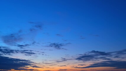 Wall Mural - the atmosphere undergoes a stunning metamorphosis. a pale, ethereal glow emerges on the horizon, cas