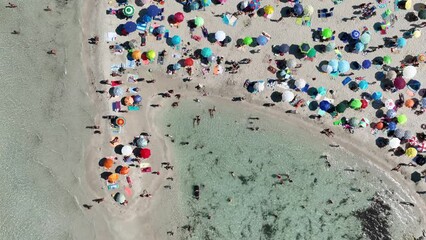 Wall Mural - aerial view on beach, people and umbrellas. vacation and adventure. europe, mediterranean sea. top v