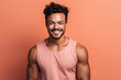 © NPix - Muscular brunette guy smiling at the camera on a pink background. Generative AI.