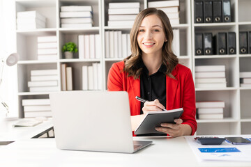 Successful businesswoman smiling happily working on laptop computer video conferencing online zoom accounting accounting finance corporate tax