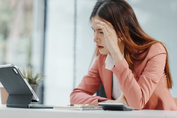 Wall Mural - Businesswoman and stress, How can they fight it? Pain, including back pain, Acne and other skin problems, like rashes, hives. Headaches. Upset stomach. Feeling like you have no control. Lack of focus