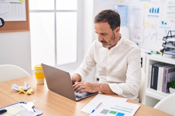 Canvas Print - Middle age man business worker using laptop working at office