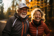 © Valeriia - Romantic and elderly healthy lifestyle concept. Senior cheerful active smiling mature couple walks looks happy in the park in afternoon autumn sunlight day time, happily retired. Generative AI