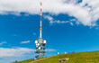 Great view of the 96-metre high Swisscom communication tower on Rigi Kulm in the middle of a meadow. The free-standing tower serves as the antenna carrier and has an accessible visitor platform.