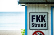 Nudist sign on a beach at the Baltic Sea