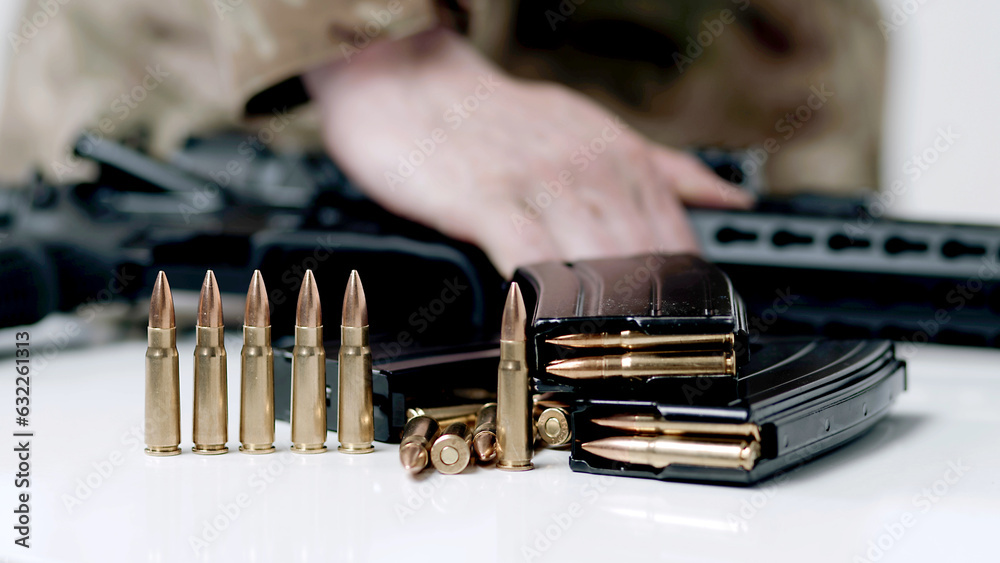 Hand taking ammo, bullets 762 caliber for ak47, gun crime military ...
