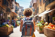 Leinwandbild Motiv Traveler girl in street of old town in Spain. Young backpacker tourist in solo travel. Vacation, holiday, trip