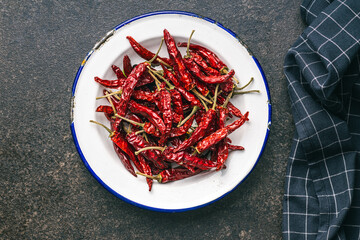 Sticker - Red chili peppers in bowl. Top view.