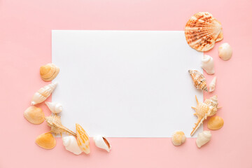 Wall Mural - Blank sheet with frame made of different seashells on pink background