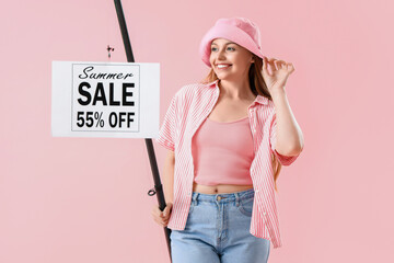 Sticker - Happy young woman with fishing rod and SALE sign on pink background. Concept of discount