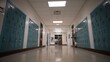 © Robert Peak - Low angle view down a long empty high school corridor hallway lined with student lockers.