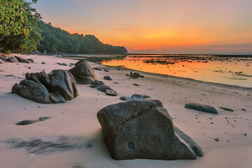 Wall Mural - Tropical beach at sunset.