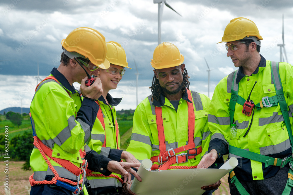 Smart professional engineers working in fieldwork outdoor. Workers ...