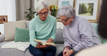 Wall Mural - Reading, book club and senior woman friends on a sofa in the living room while storytelling together. Retirement, conversation and hobby with elderly women enjoying a fiction novel in a home