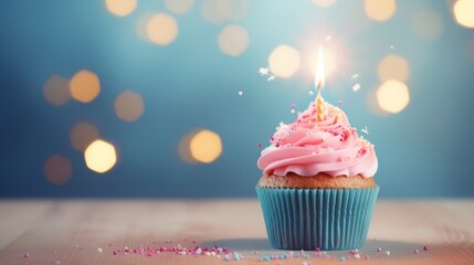 delicious birthday cupcake on table on light background, copy space, high quality