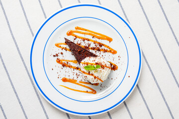 Canvas Print - brownie cake with caramel sauce and ice cream