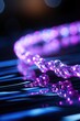 © Maria Starus - A close up of a chain of pink beads. AI.