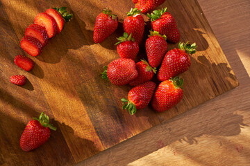 Fresh and juicy organic strawberries on chefs table.