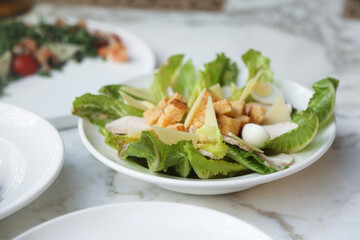 Wall Mural - Traditional Caesar salad with chicken