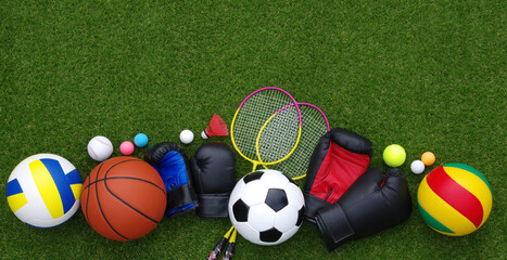 Canvas Print - sport equipment on green grass